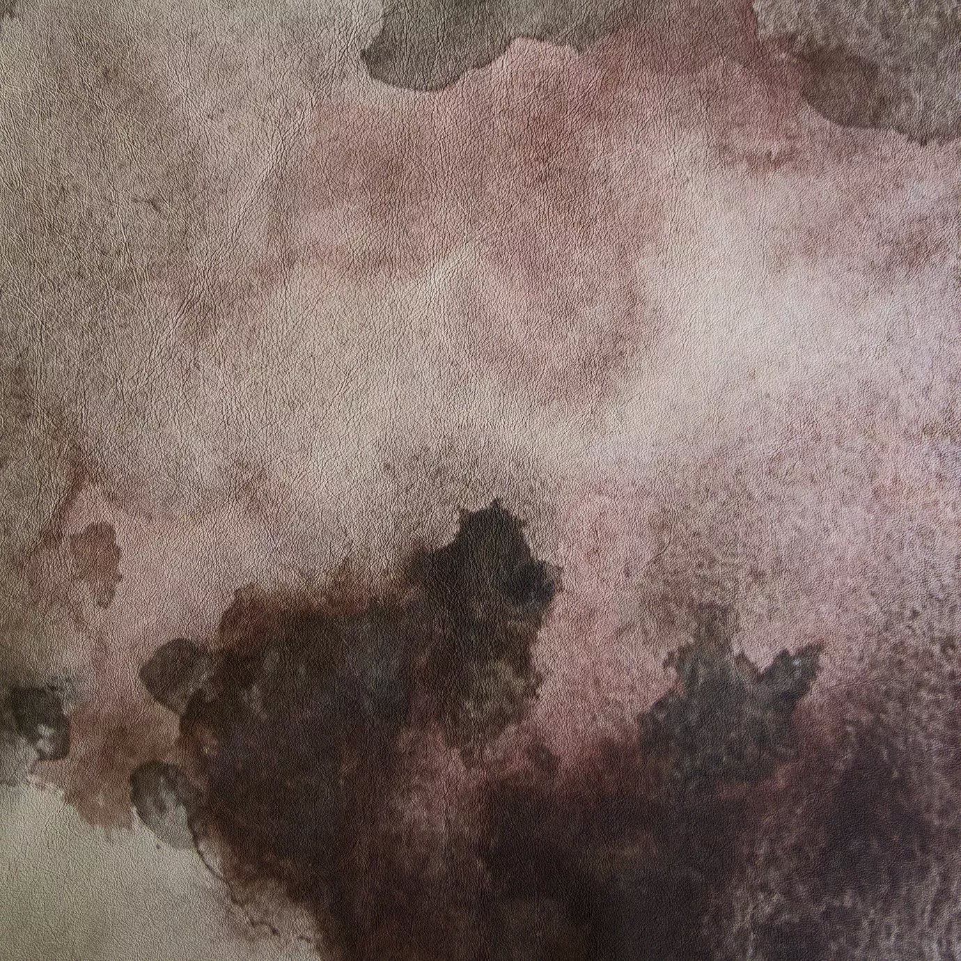 Textured Watermark Terra Leather with a watercolor-like blend of brown, beige, and soft pink hues.