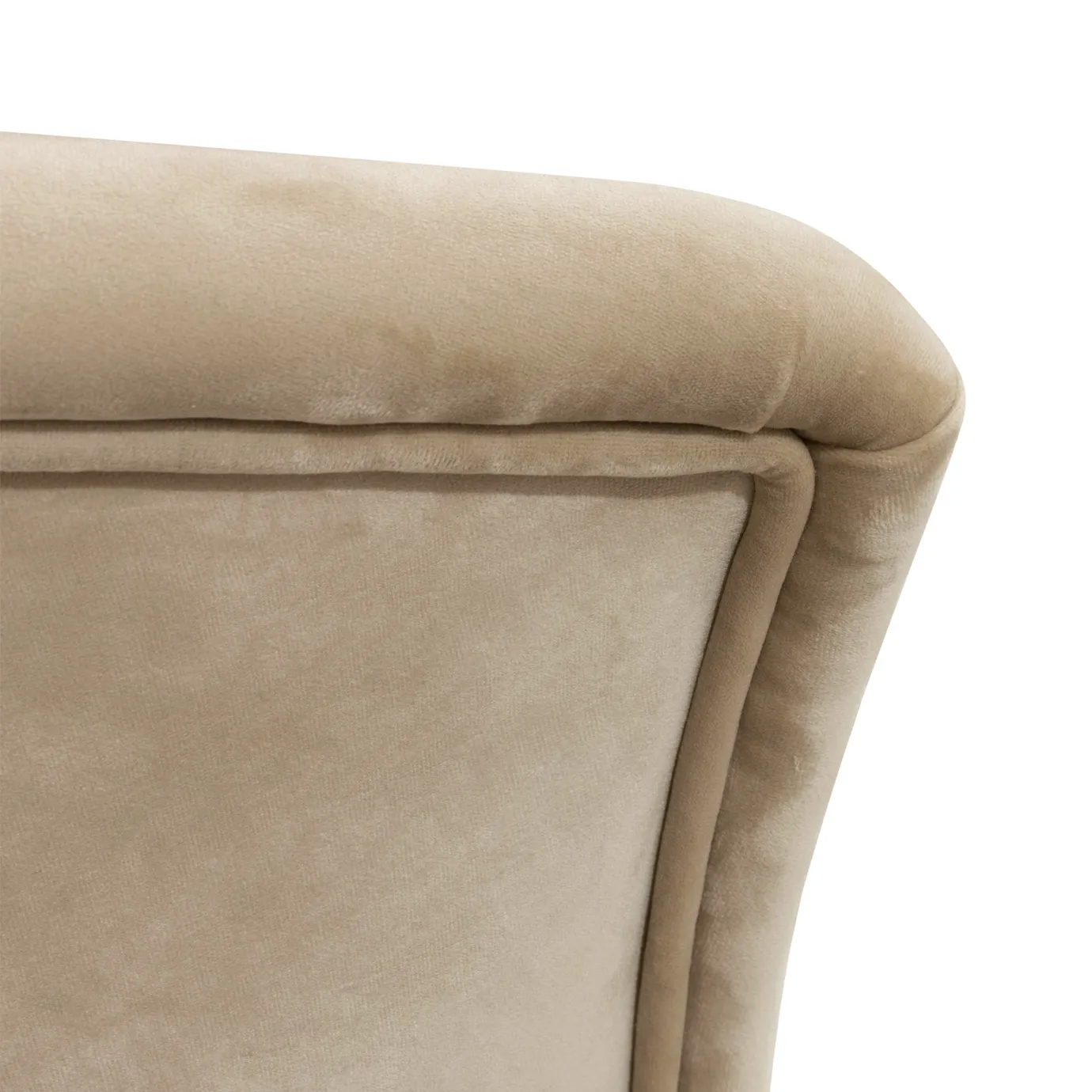 Close-up on the Marseille Chair's backrest corner, showing its smooth curve and the soft, neutral-toned upholstery.