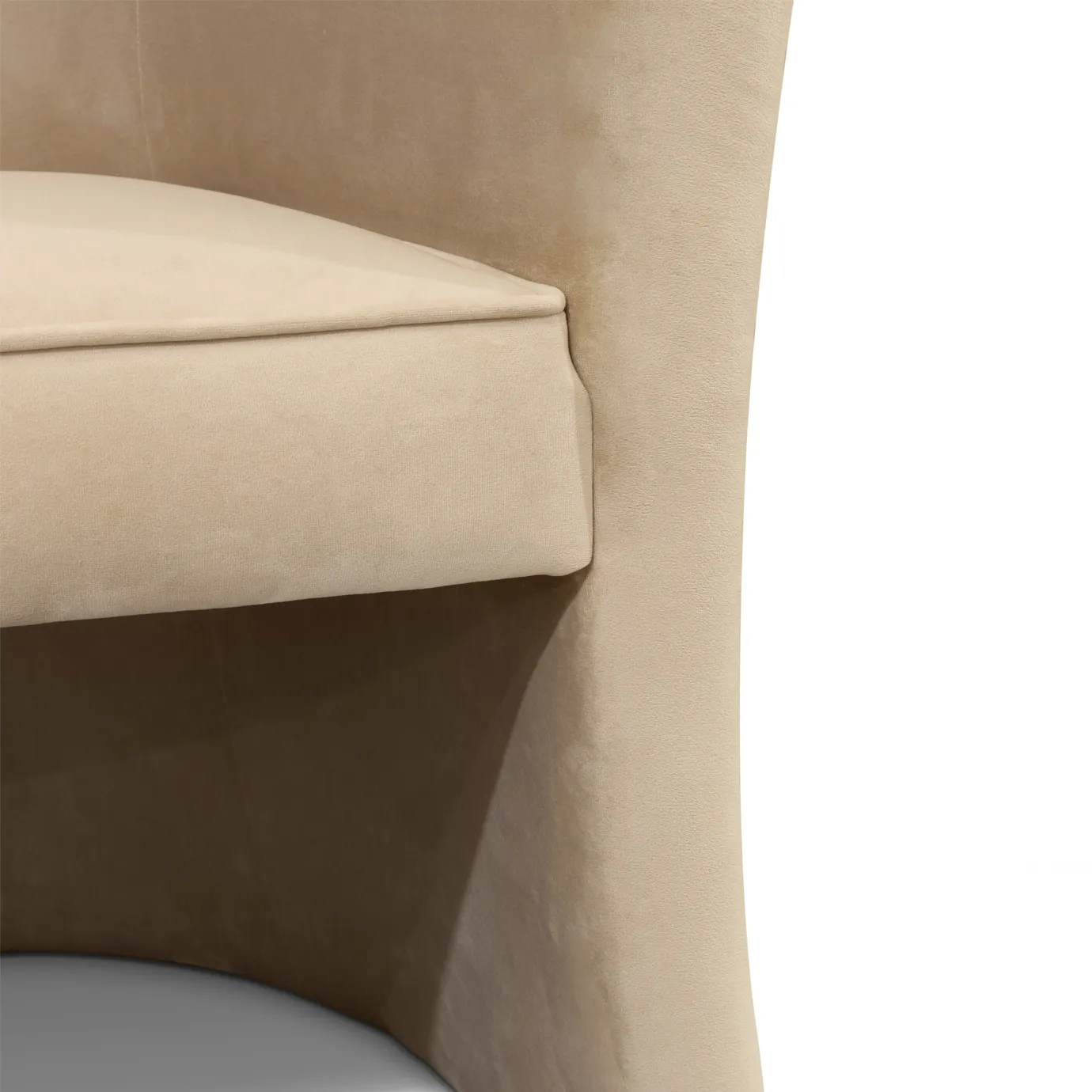 Close-up of the Marseille Chair, highlighting its soft, neutral-toned upholstery and curved form.