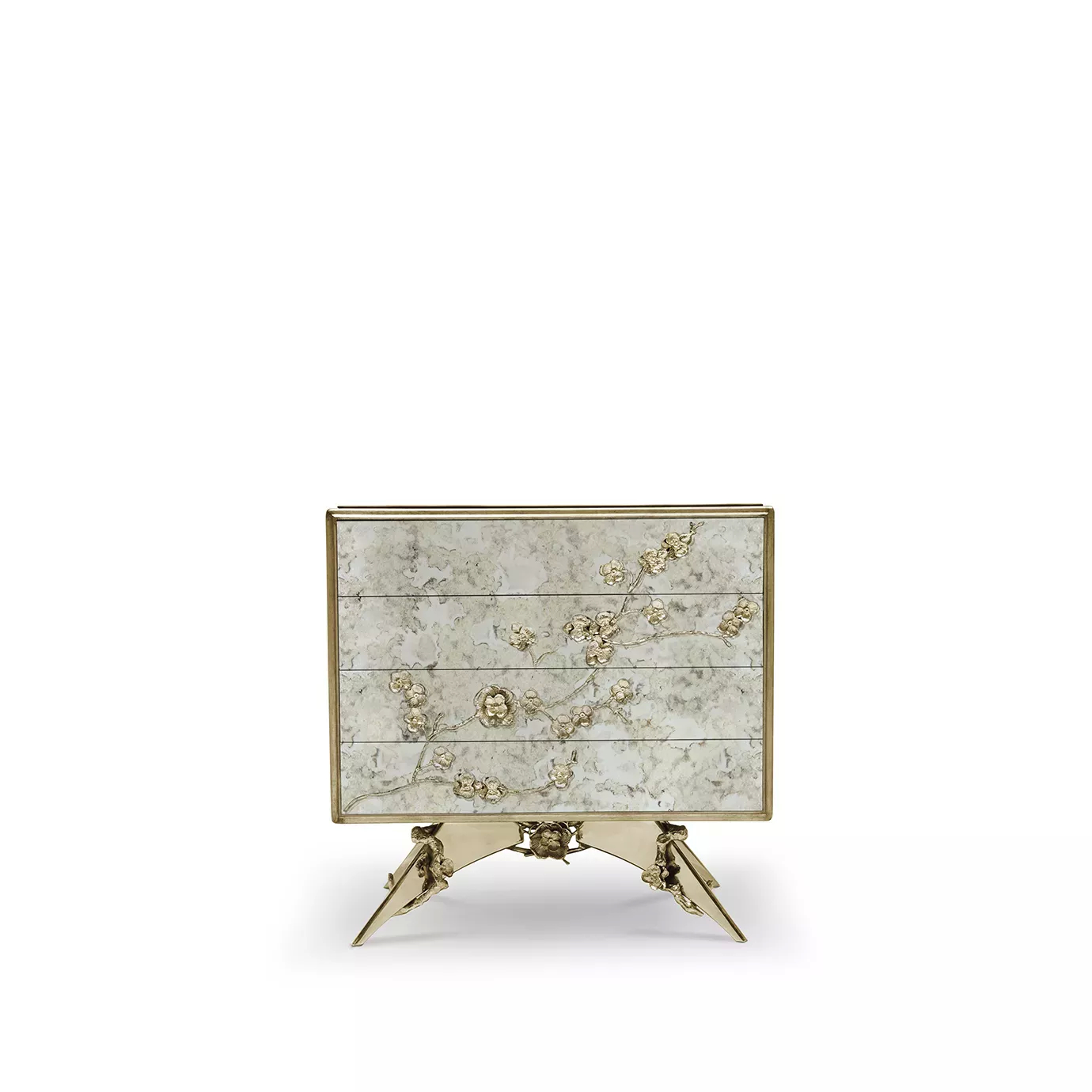 The Spellbound Aged Mirror Nightstand is adorned with a golden frame and elegant golden flower-shaped details along its four drawers.