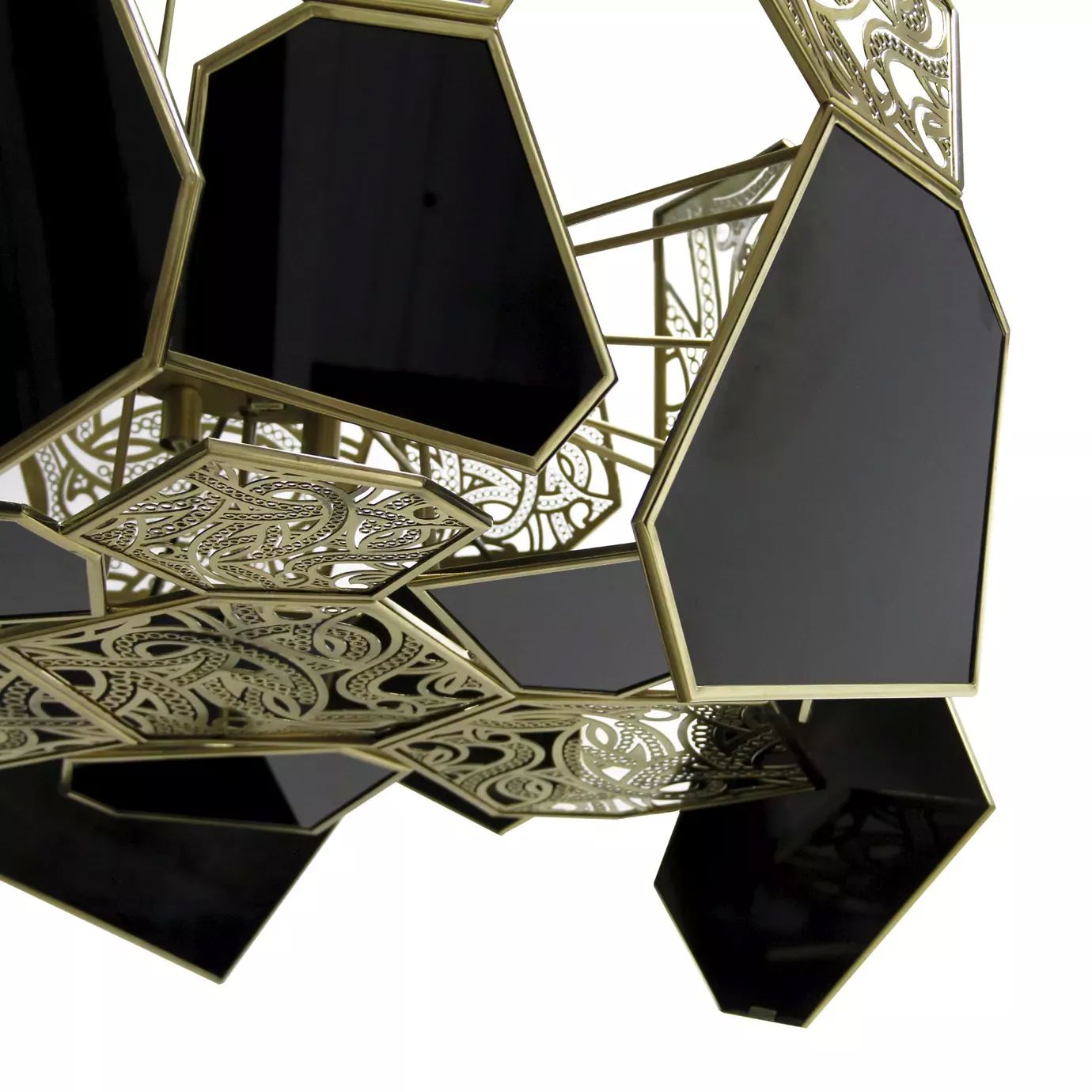 Detailed view of the Hypnotic Lacquer Chandelier, showcasing the layered arrangement of ornate gold and glossy black geometric elements.
