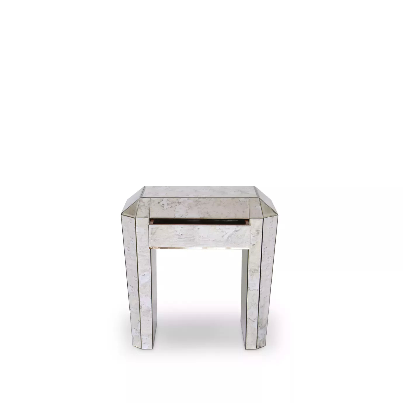 Elegant Tamara Nightstand with faceted mirrored surface and discreet drawer.