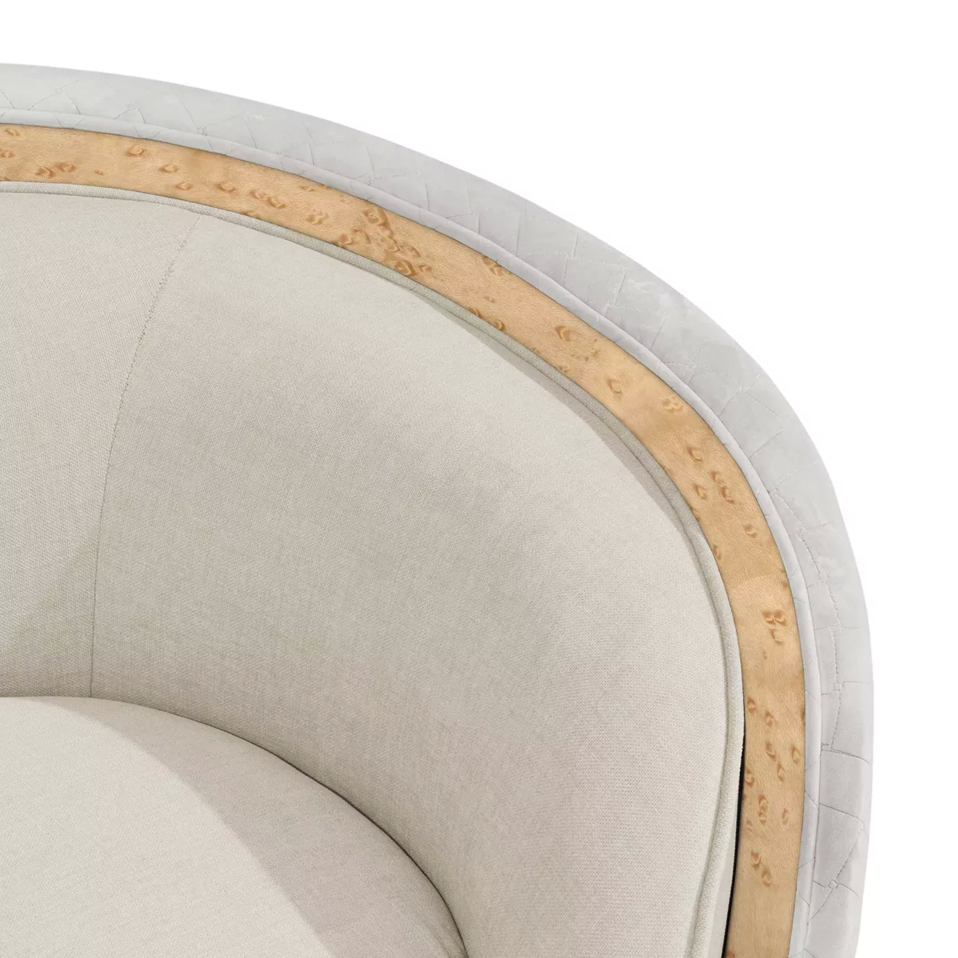 Close-up of the Sultana Sofa's curved back, showing light upholstery, quilted side, and wooden trim detail.
