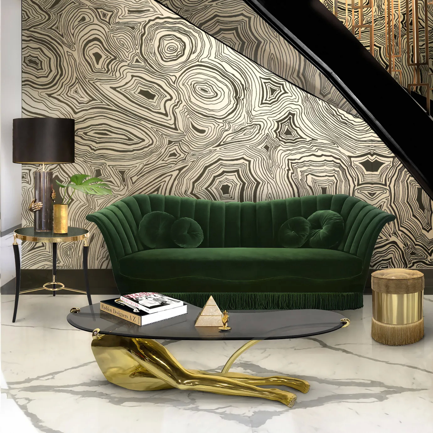 Tabu Polished Brass Coffee Table in a luxurious living room, featuring a glossy glass top and human-like base in polished brass, styled with books and decor.