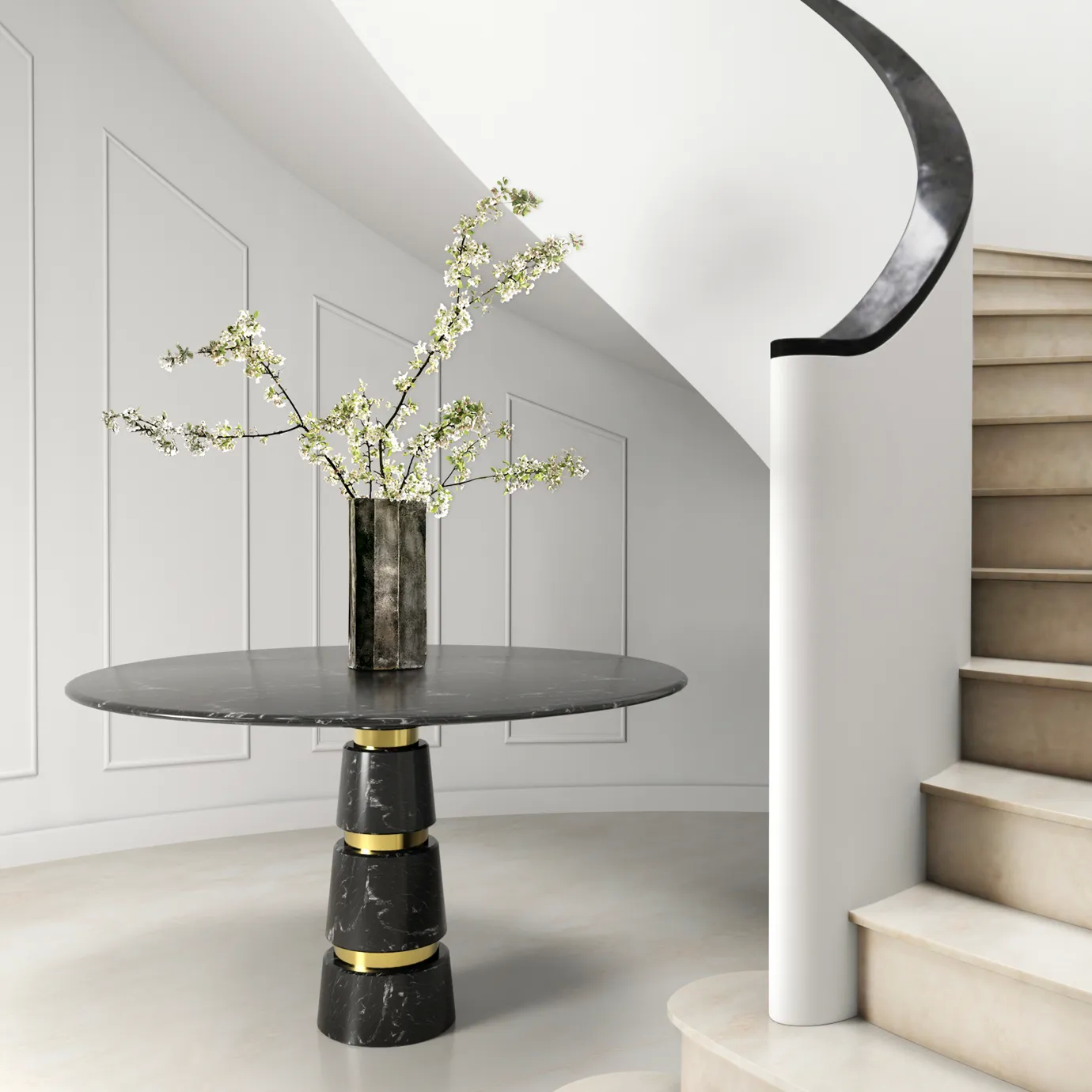 Avalanche Nero Marquina Marble Dining Table in a modern room, with black marble top, gold accents, and a vase of white flowers.