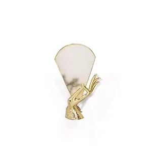 Muse Alabaster Sconce featuring a graceful, slightly angled design with a gold base and alabaster shade.