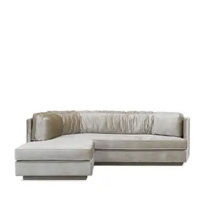 Elegant Lisboa Sofa with a chaise lounge, upholstered in luxurious, ruched velvet. Its design offers sophisticated comfort and style.