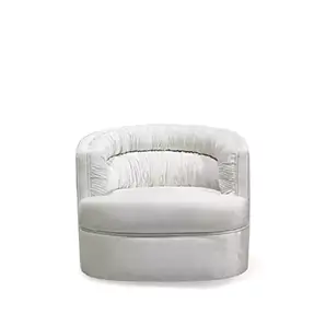 Stylish white velvet Cocktail Armchair, known for its compact size and elegant design. Perfect for smaller spaces.