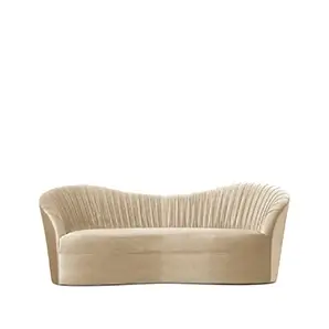 Kelly Sofa: A chic, curved sofa in a warm beige tone, featuring elegant vertical channel tufting on the backrest.