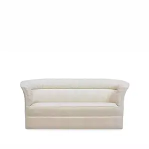 Lovely Sofa, front view: A sophisticated sofa in a soft, light color with distinctive vertical channel tufting on the back and gently curved arms.