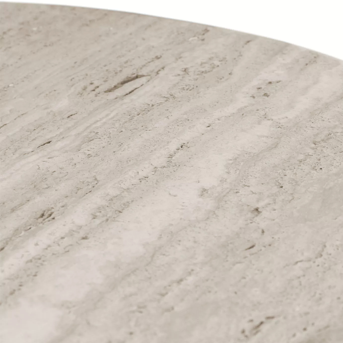 Paris Oval Dining Table: A close-up reveals the natural, porous texture and subtle, flowing patterns within the light travertine marble surface.