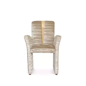 Estelle Dining Chair, front view: Elegant silhouette with textured, vertical channel upholstery in soft, shimmering tones and subtle armrests.