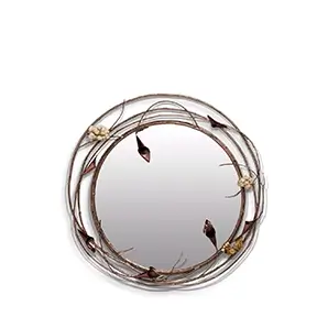 Stella Crystalized Mirror in a ring-shaped form, surrounded by a floral themed frame, displaying Calla Lilies and stems.