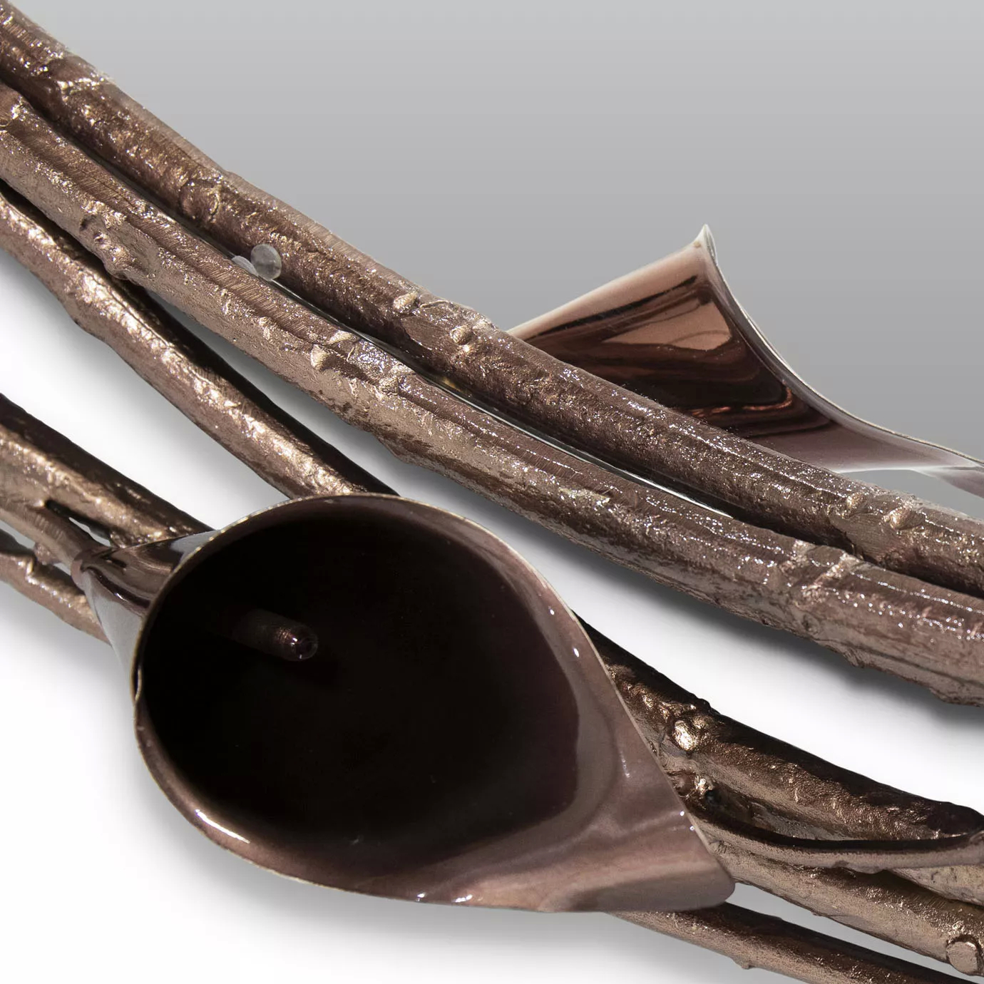 Close look on the crafted Copper Chromium Calla Lilies of the Stella Crystalized Mirror.