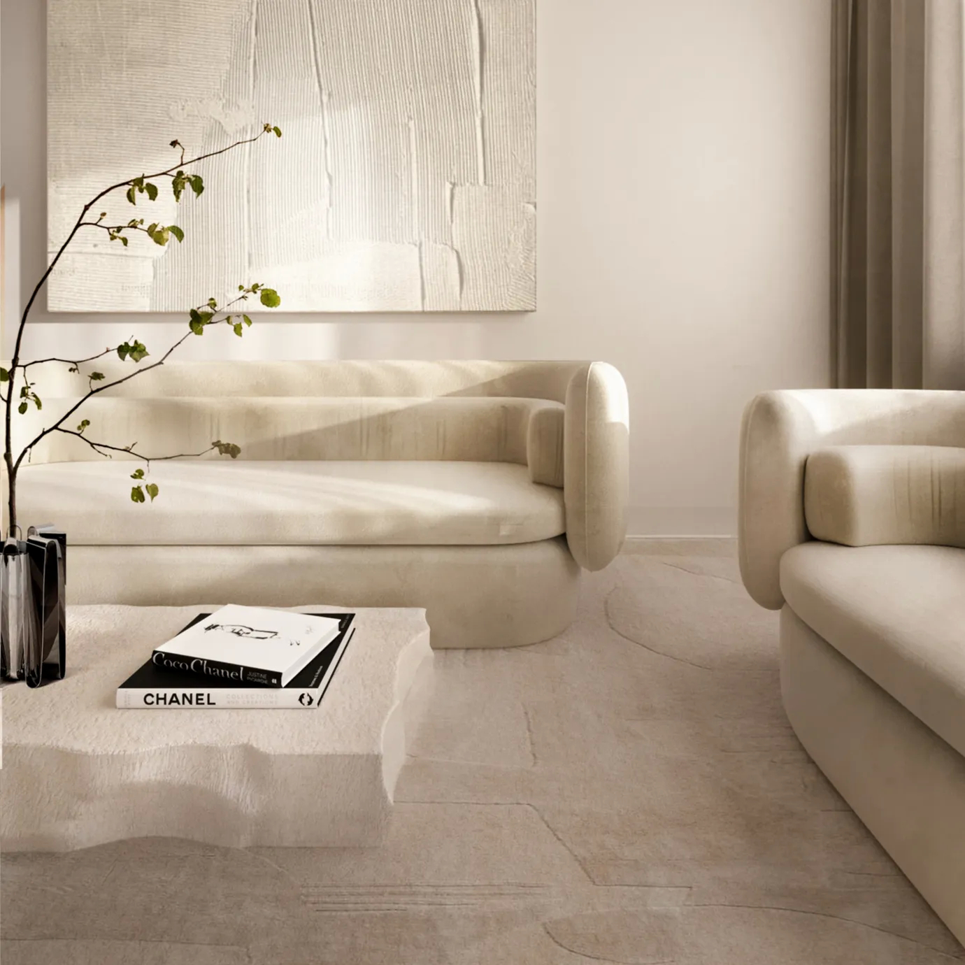 The Deb Sofa, with its soft, creamy upholstery and unique curved design, adds a touch of modern elegance to a bright, minimalist room.