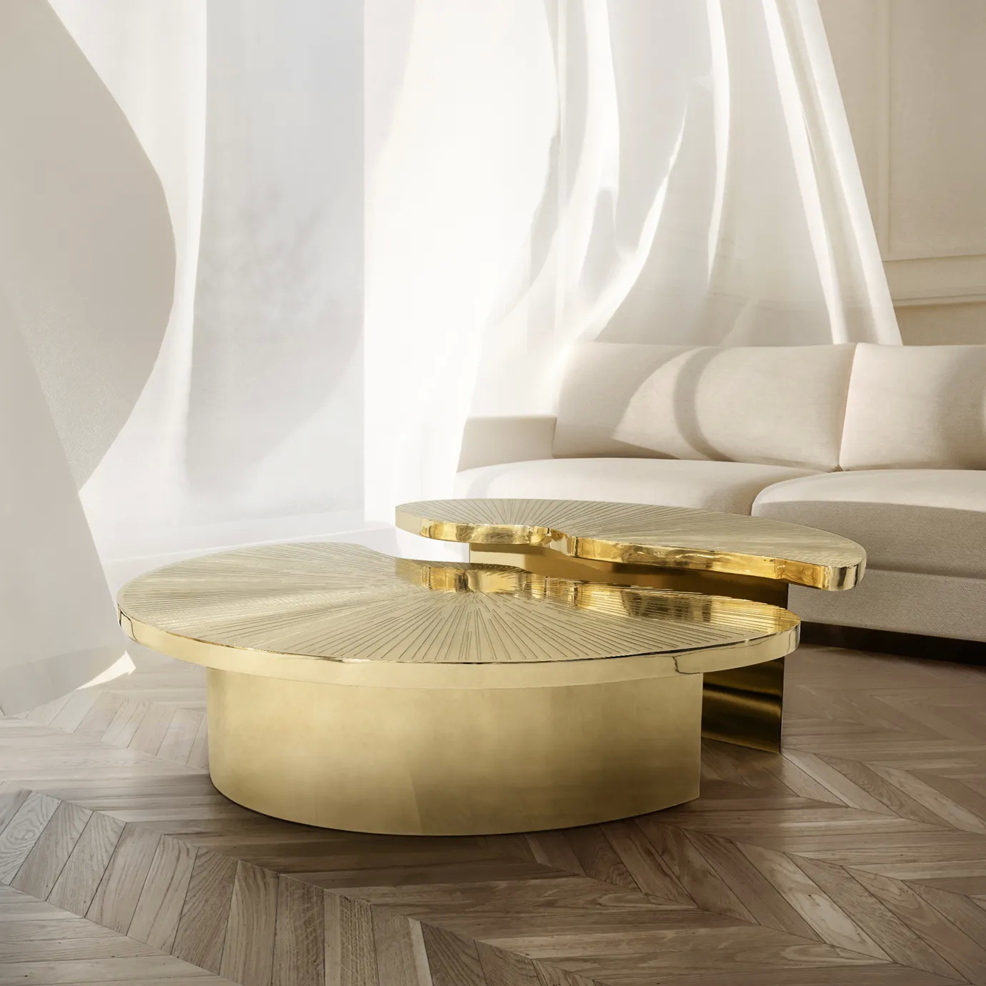 A minimalist living room in neutral hues, with a glamourous golden Myth Coffee Table in the center, serving as a focal point. The table has a round shape and is divided in two different heighted parts.