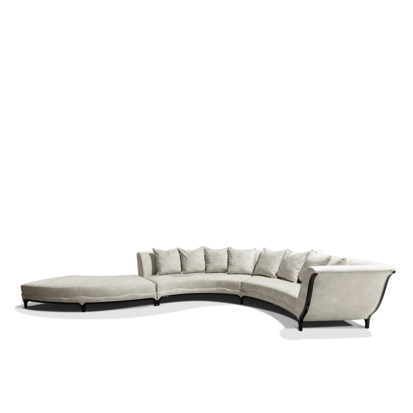 The Heavenly Sofa features a sweeping, curved design with plush, light upholstery and numerous soft cushions.