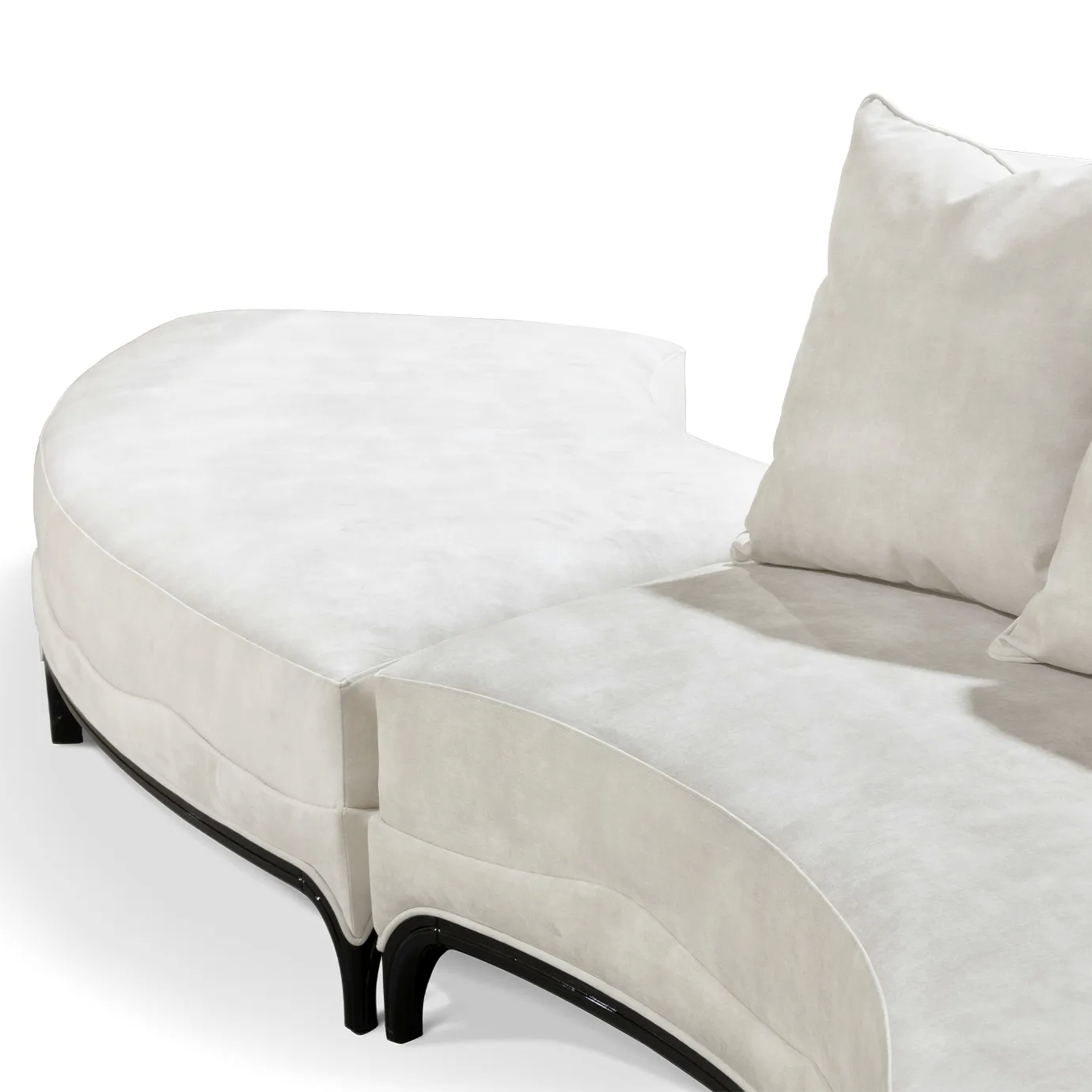 Close-up on the Heavenly Sofa showcasing its soft, light upholstery, plush cushions, and elegant dark trim detail.