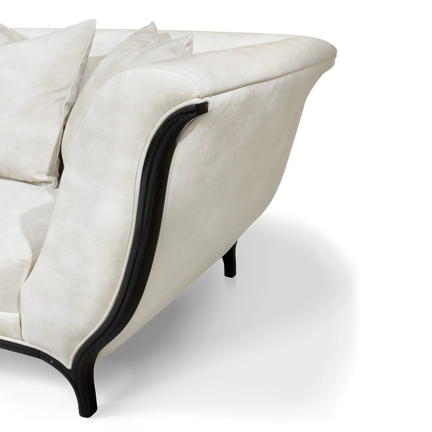 Close-up of the Heavenly Sofa's armrest, highlighting its elegant curve, light upholstery, and the sleek, dark trim detail.