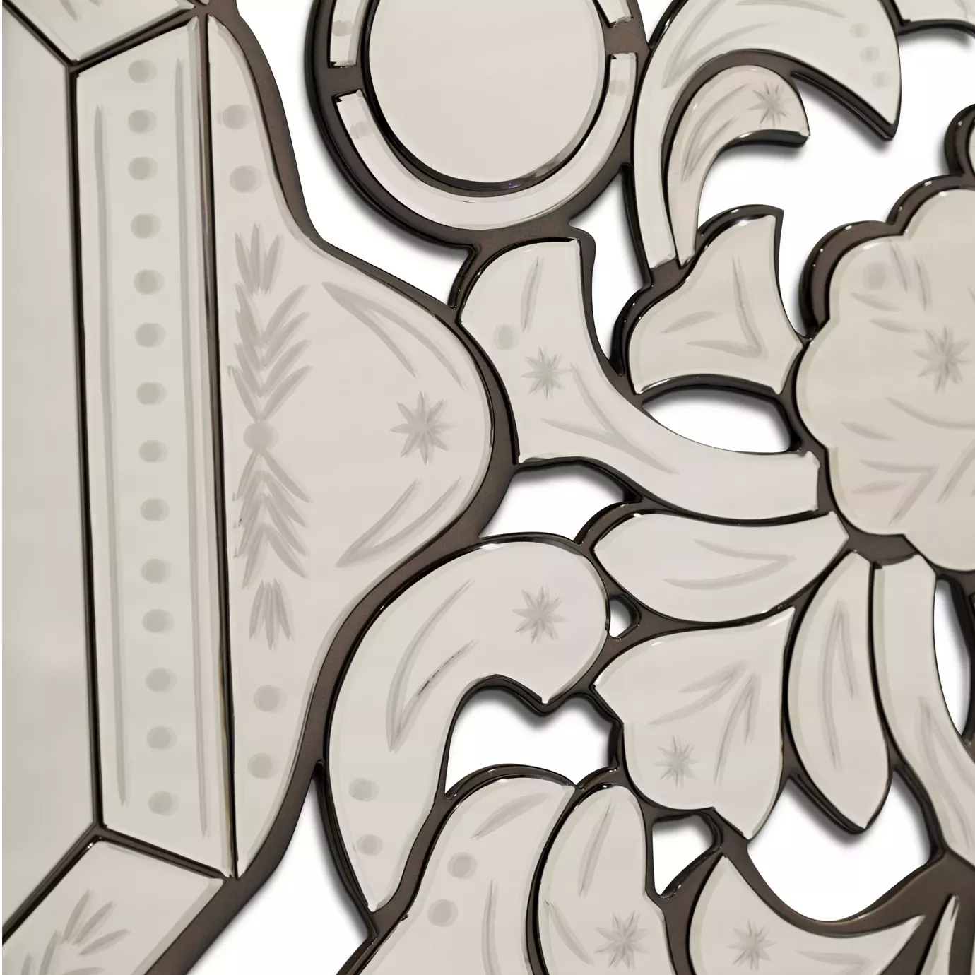 Close-up of the intricate and engraved details of the ornate Addicta Mirror.
