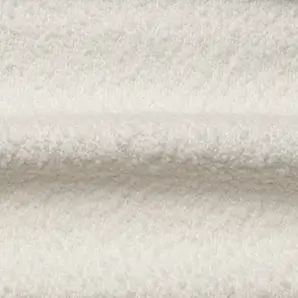 Soft, textured Iconic Boucle fabric with a looped yarn surface in a creamy white hue.