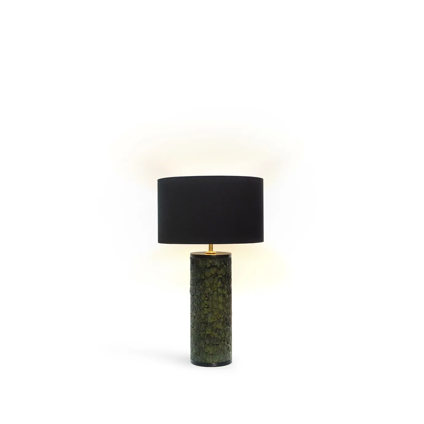 Tailor Peacock Feather Table Lamp with a cylindrical base covered in green peacock feathers and a round black lampshade.