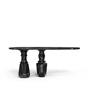 Black marble Pietra Nero Marquina Console table with an oval top and two uniquely shaped pedestals.