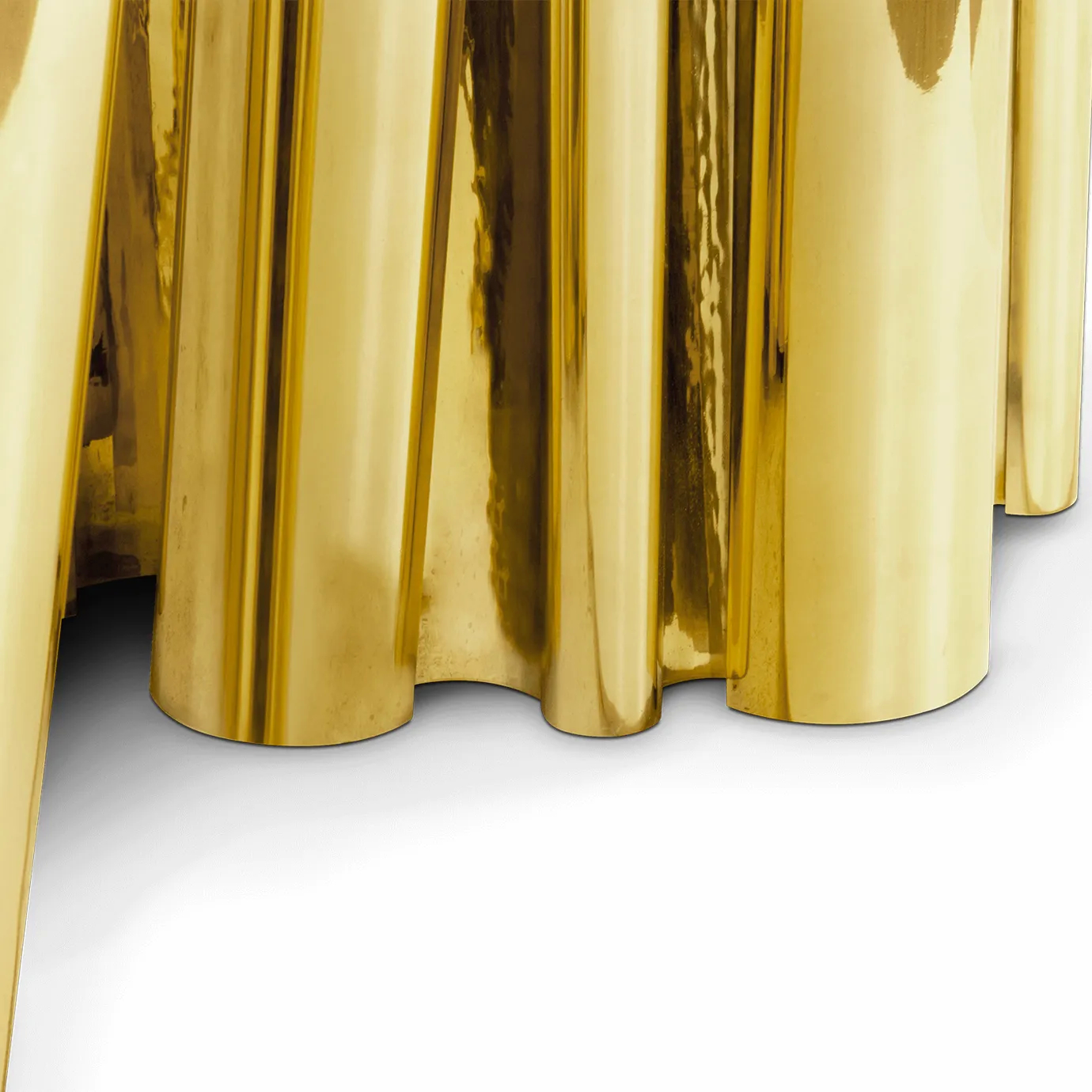 Close-up of Fortuna Dining Table base, featuring golden, flowing legs with a reflective, organic design.