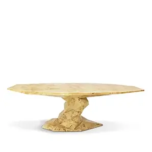 Bonsai Poplar Root Dining Table with a natural stone top and geometric, textured base.