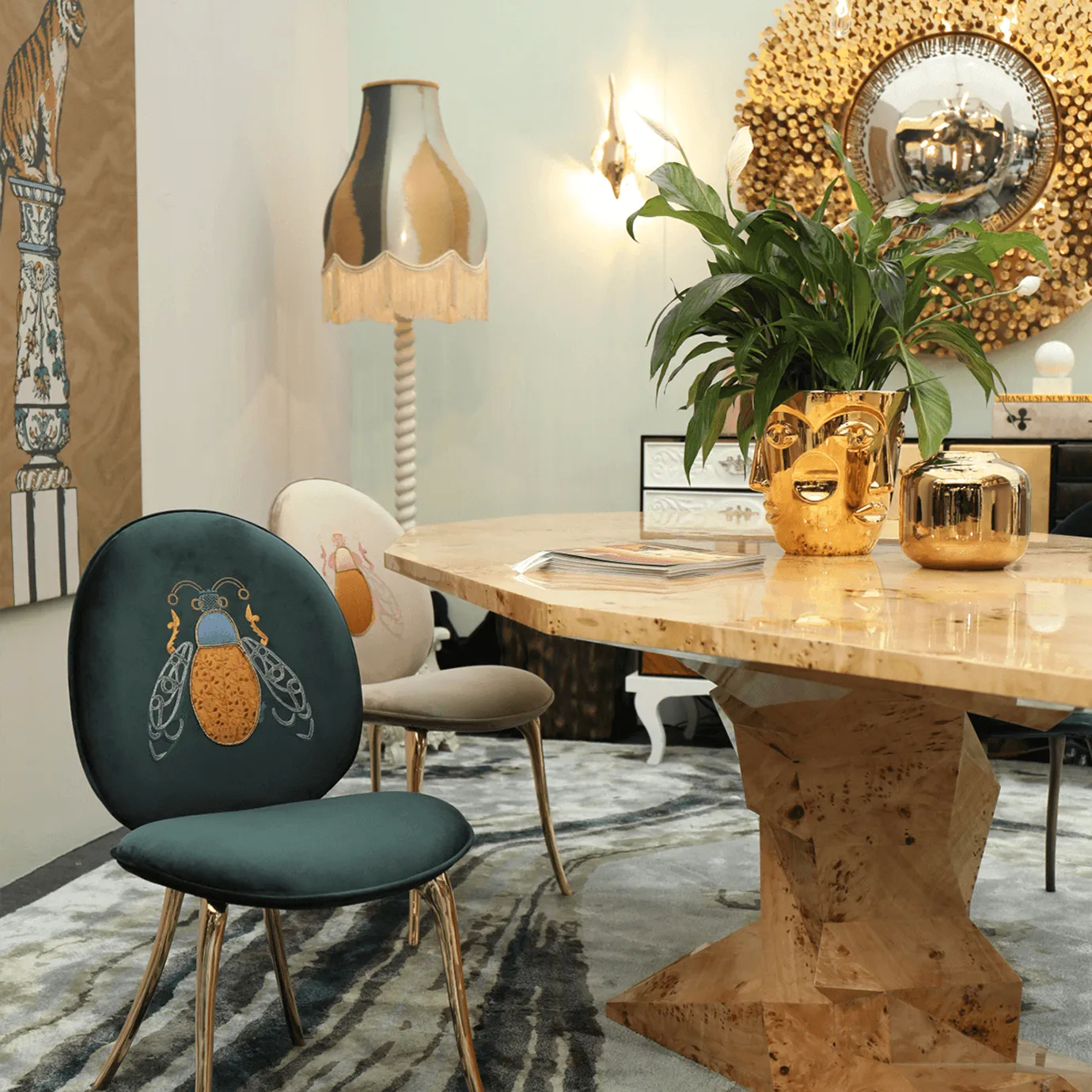 Bonsai Poplar Root Dining Table styled in a modern, eclectic dining room with gold accents and decorative decor.