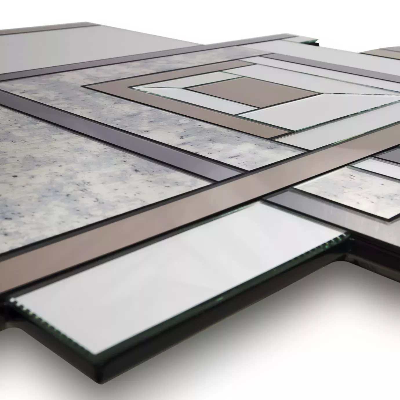 Elegant close-up of the geometric design with mirrored details in different tones of the Lemprica Mirror.