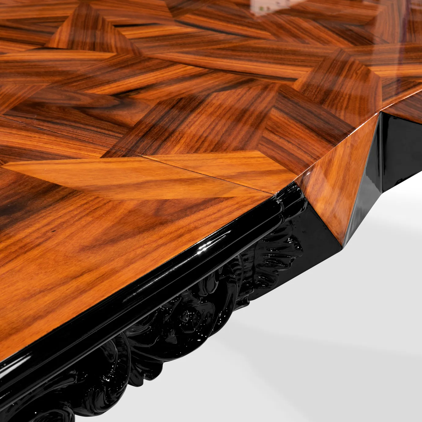 Luxurious Royal Dining Table close-up: intricate wood and ornate black details.