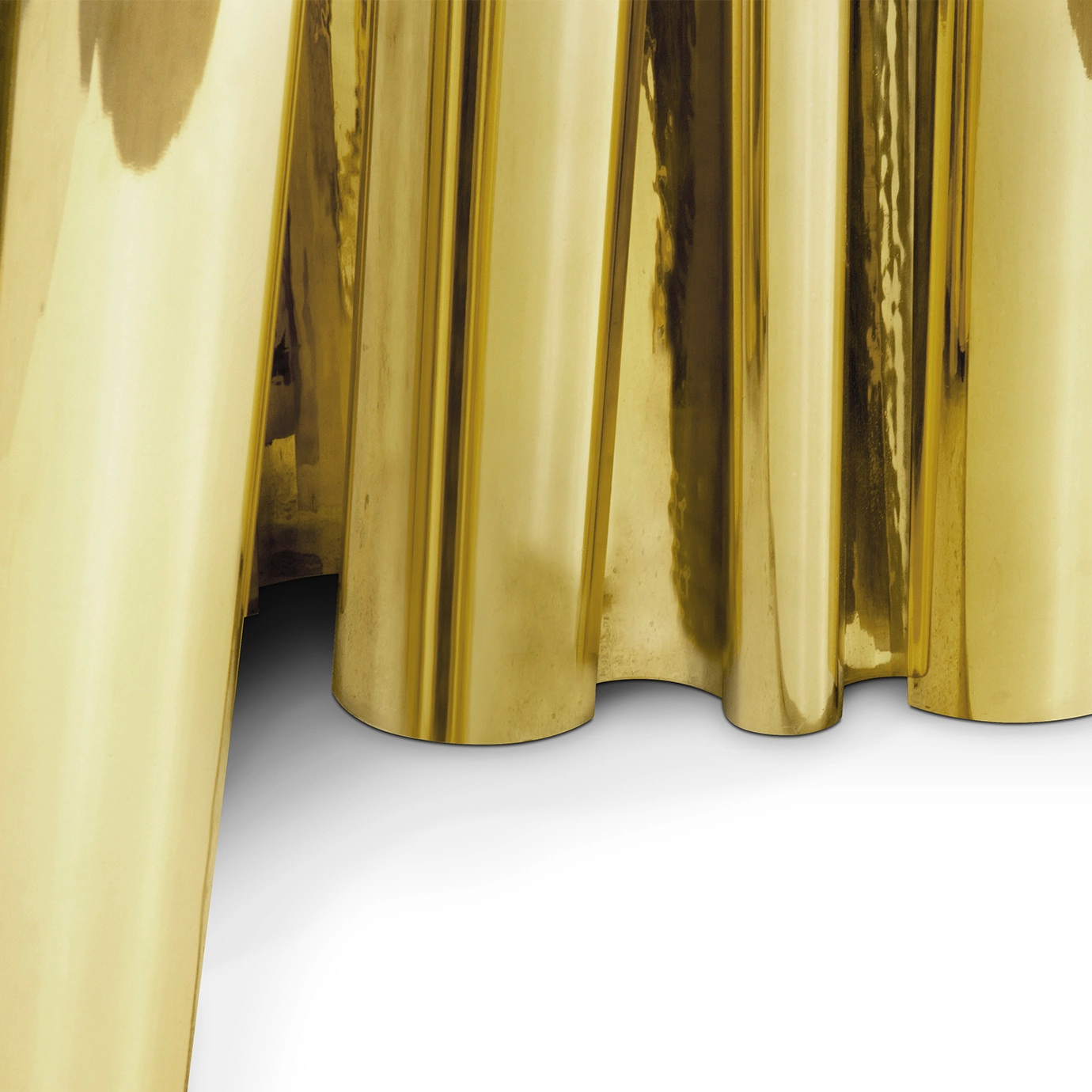 Close-up of the Fortuna Round Gold Dining Table's luxurious, high-shine golden base.