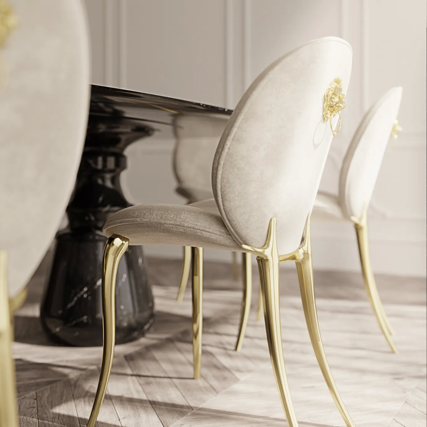 Cream Soleil chair with curved backrest and polished brass legs in a pastel-toned room.