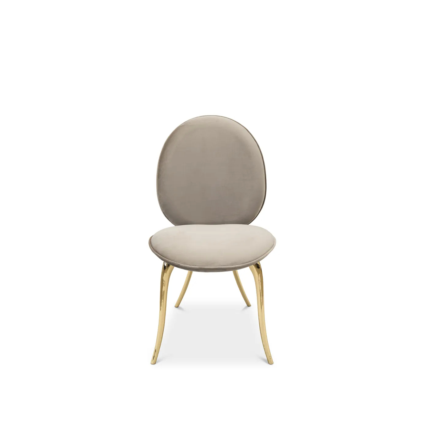 Cream velvet chair with curved backrest and polished brass legs.