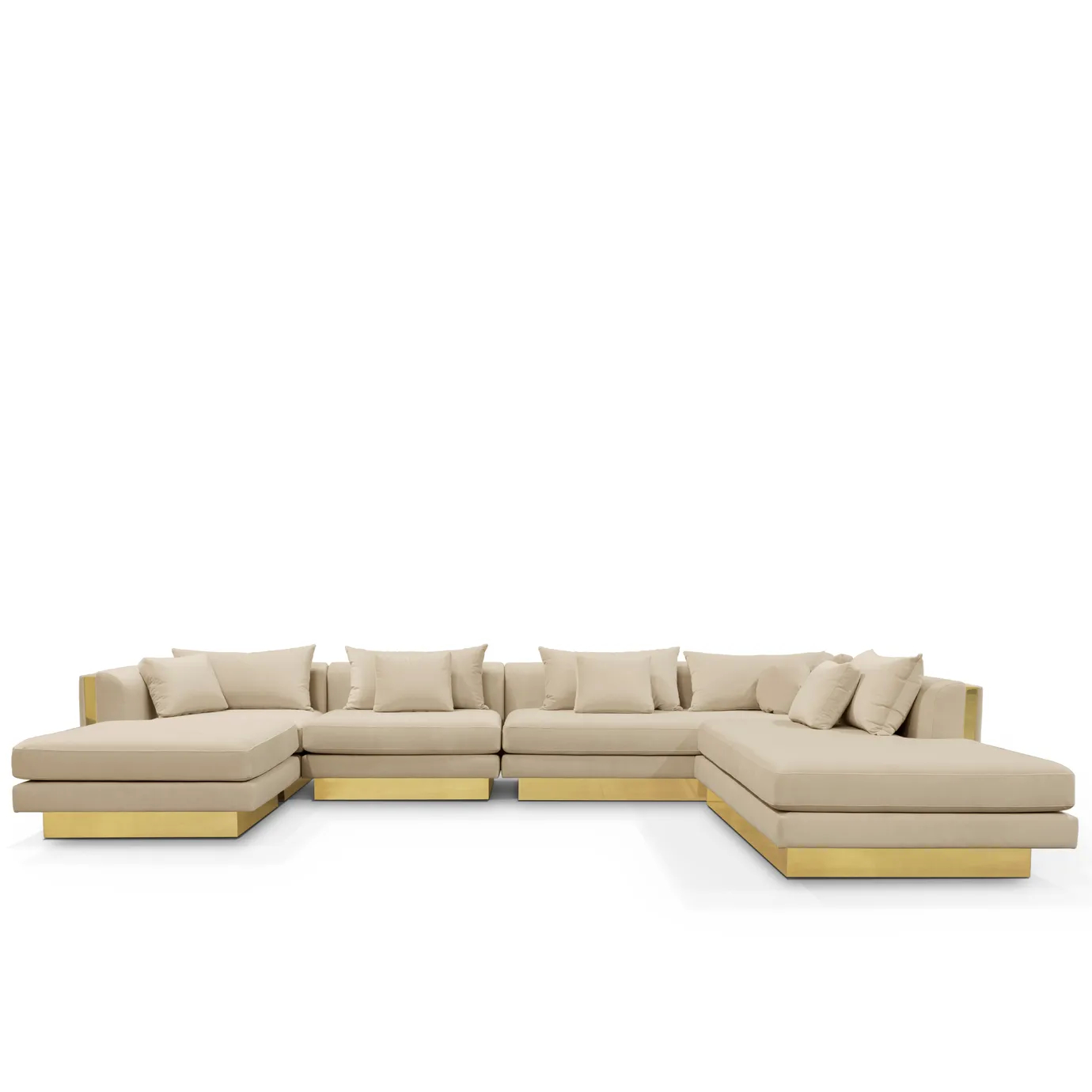 Curved modular sofa with polished brass accents and velvet upholstery