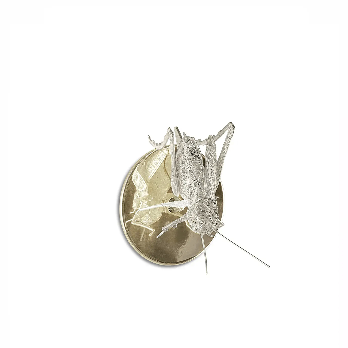 Close-up of grasshopper sconces highlighting detailed filigree wings, textured metal body, and antique finish for refined nature-inspired design