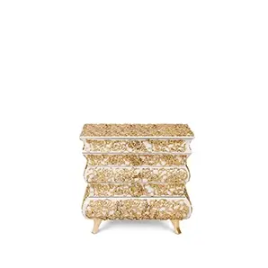 Modern white nightstand with geometric openwork design, showcasing a sleek silhouette and minimalist aesthetic