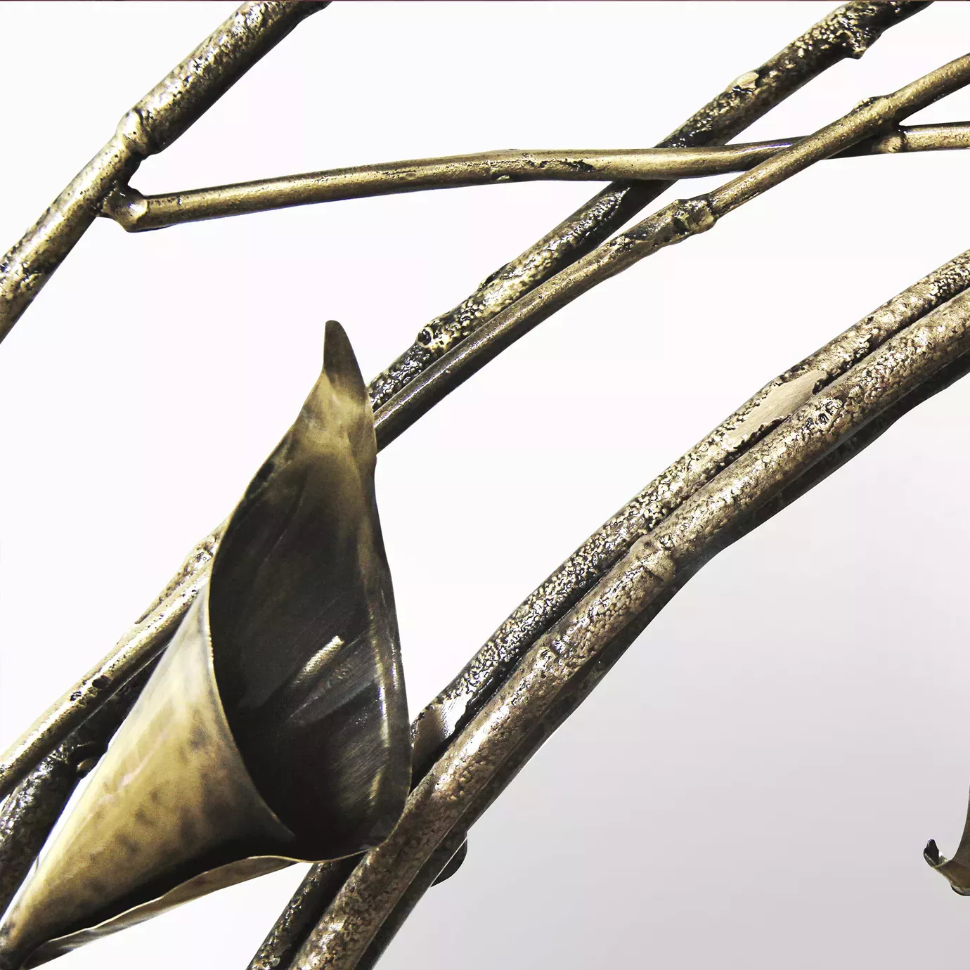 Close-up of the Stella Mirror frame, displaying a copper-collored Calla Lily in detail.