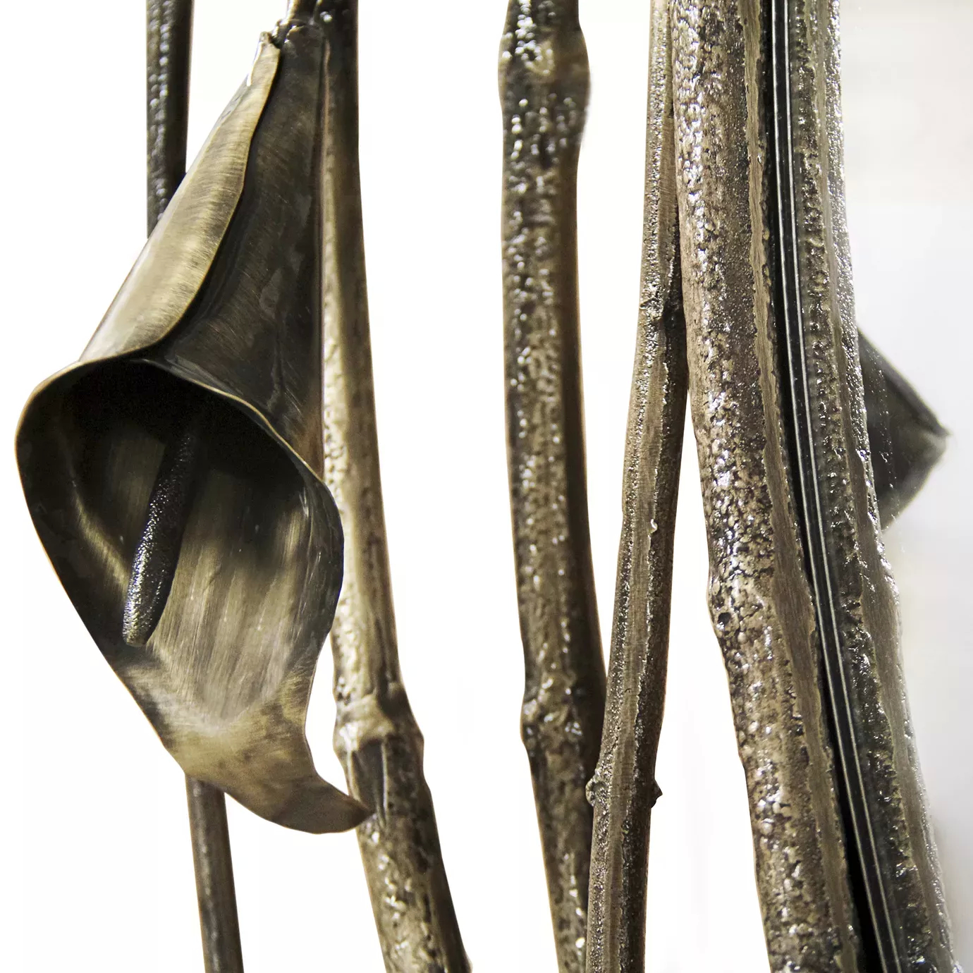 Close view of the Stella Mirror frame, exhibiting one copper collored Calla Lily.