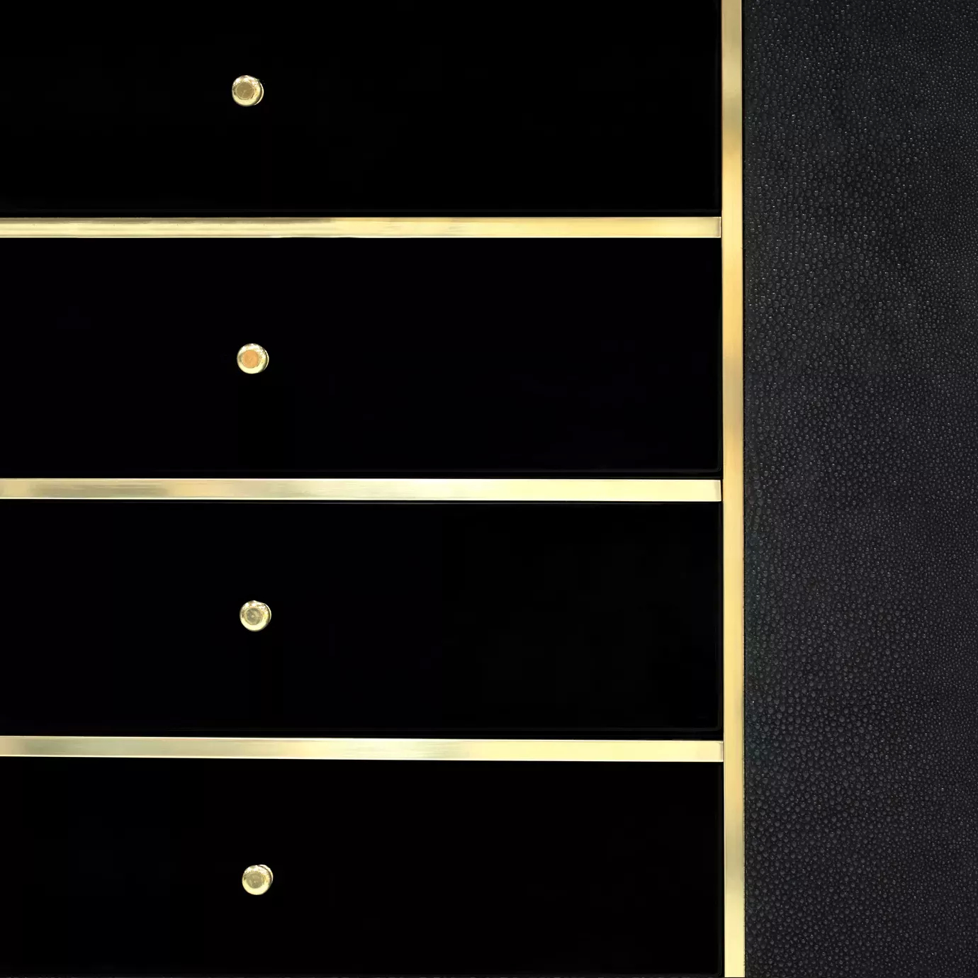Detail of the black drawers with golden accents of the Sinful Cabinet.