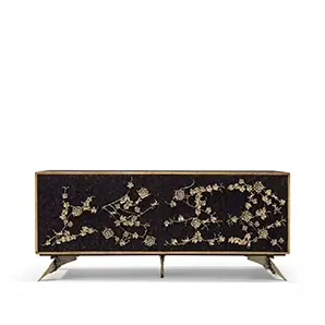 The Spellbound Purple Feather Cabinet's structure is adorned with purple peacock feathers ornamented with elegant golden flower-shaped details along the four front doors.