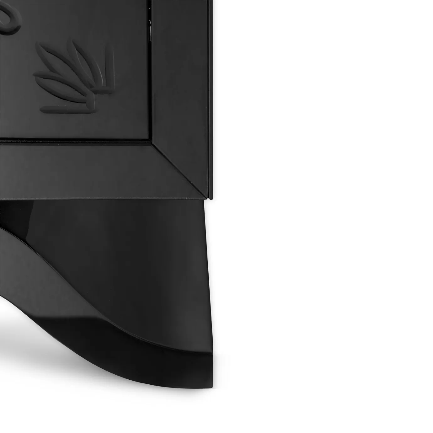 Close-up of the feet of Metropolitan vanity cabinet, highlighting the elegant gold accents and sleek design.