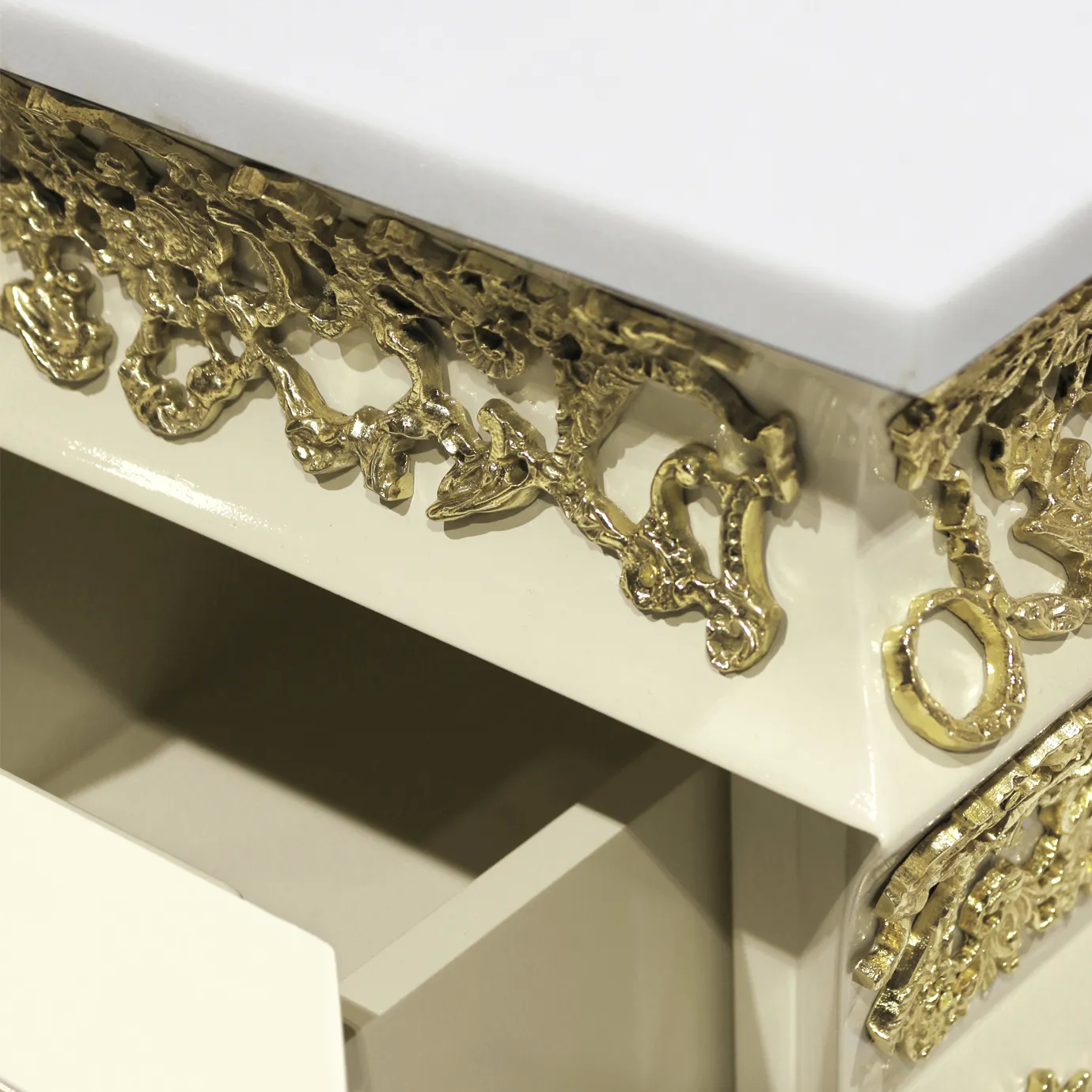 Close-up of Crochet vanity cabinet drawer, highlighting the textured design and elegant gold handle.