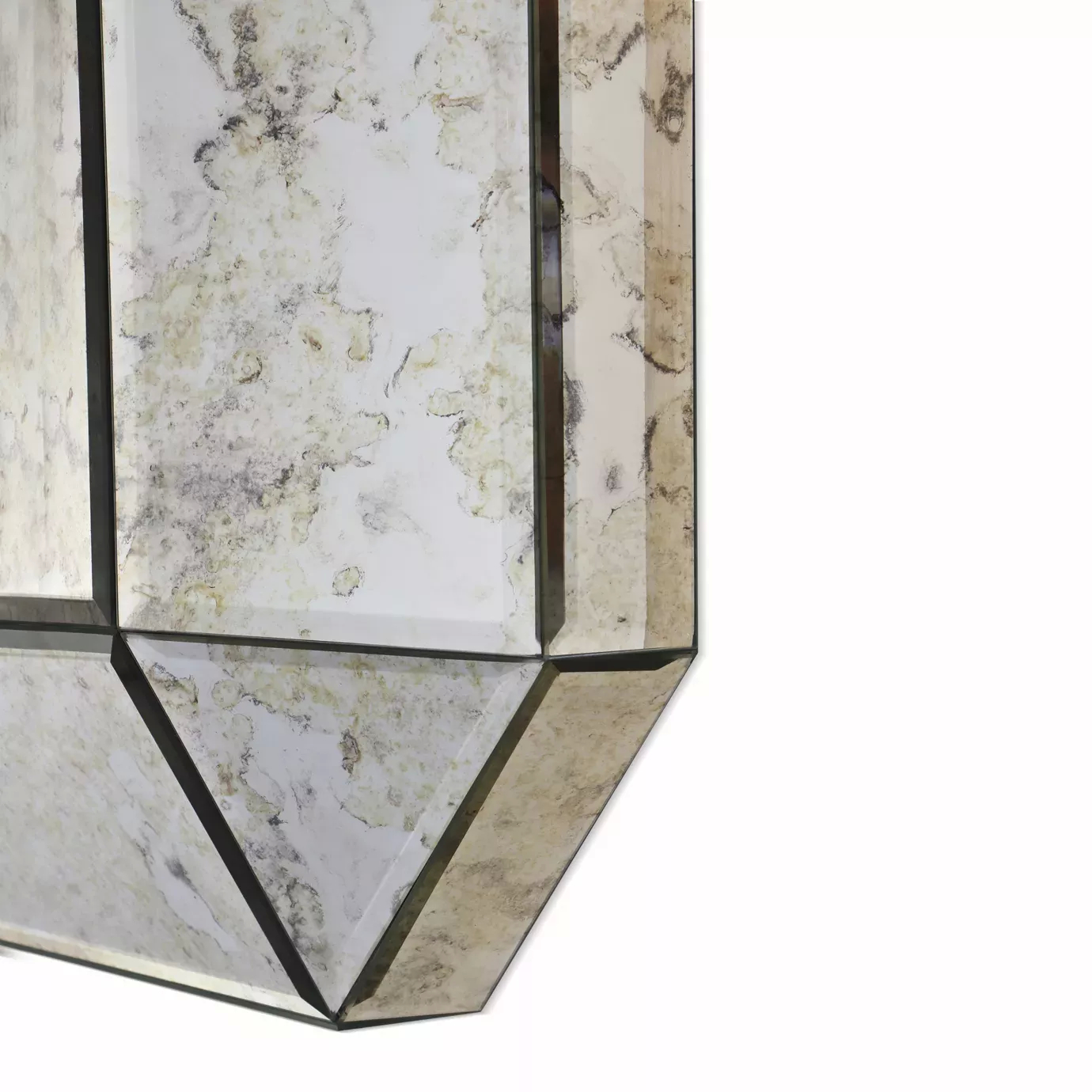 Elegant close-up of the corner with aged mirror of the Tamara Square Mirror.