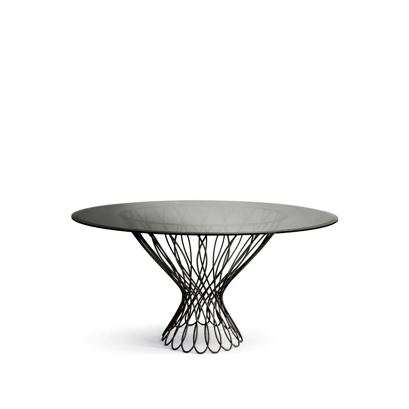 Allure Dining Table: Sophisticated smoked glass top resting on the interlaced black silhouette-shaped structure.