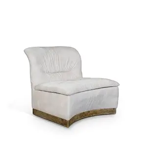 45-degree view of Cleopatra chair with luxurious velvet upholstery, sleek gold frame, and curved backrest.