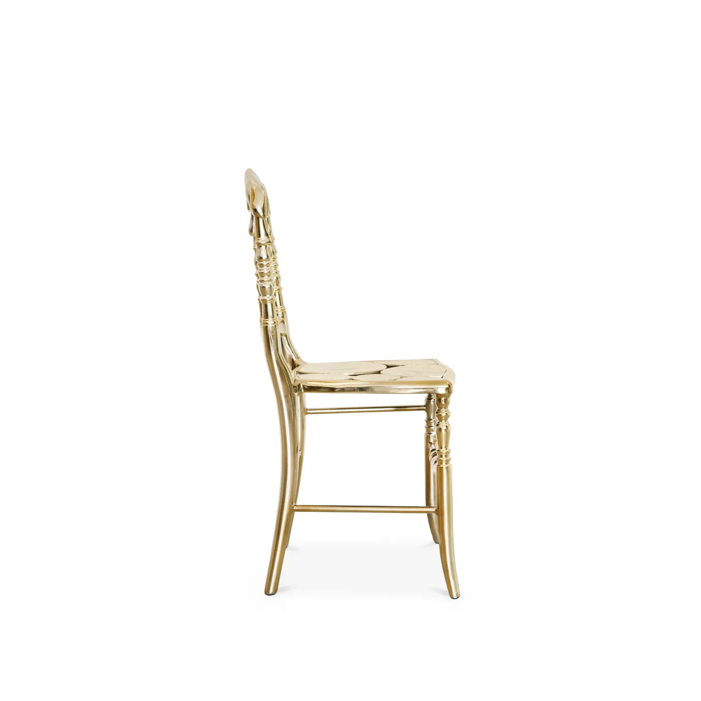 Chic gold chair with a modern, curved backrest and sleek, elegant design. Perfect for luxury interiors.
