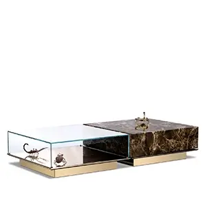 Metamorphosis Emperador Center Table with glass and marble design, gold accents, brass base.