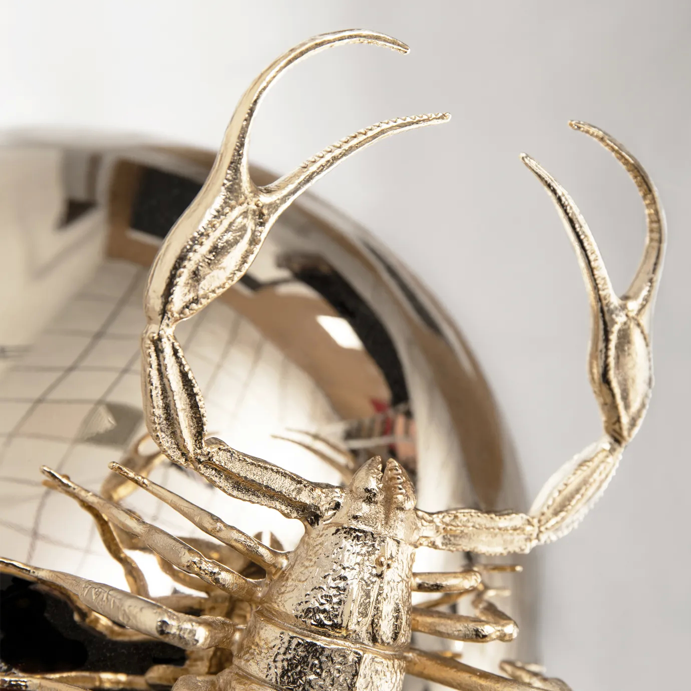 Elegant Metamorphosis mirror with a striking frame, ideal for sophisticated interiors.
